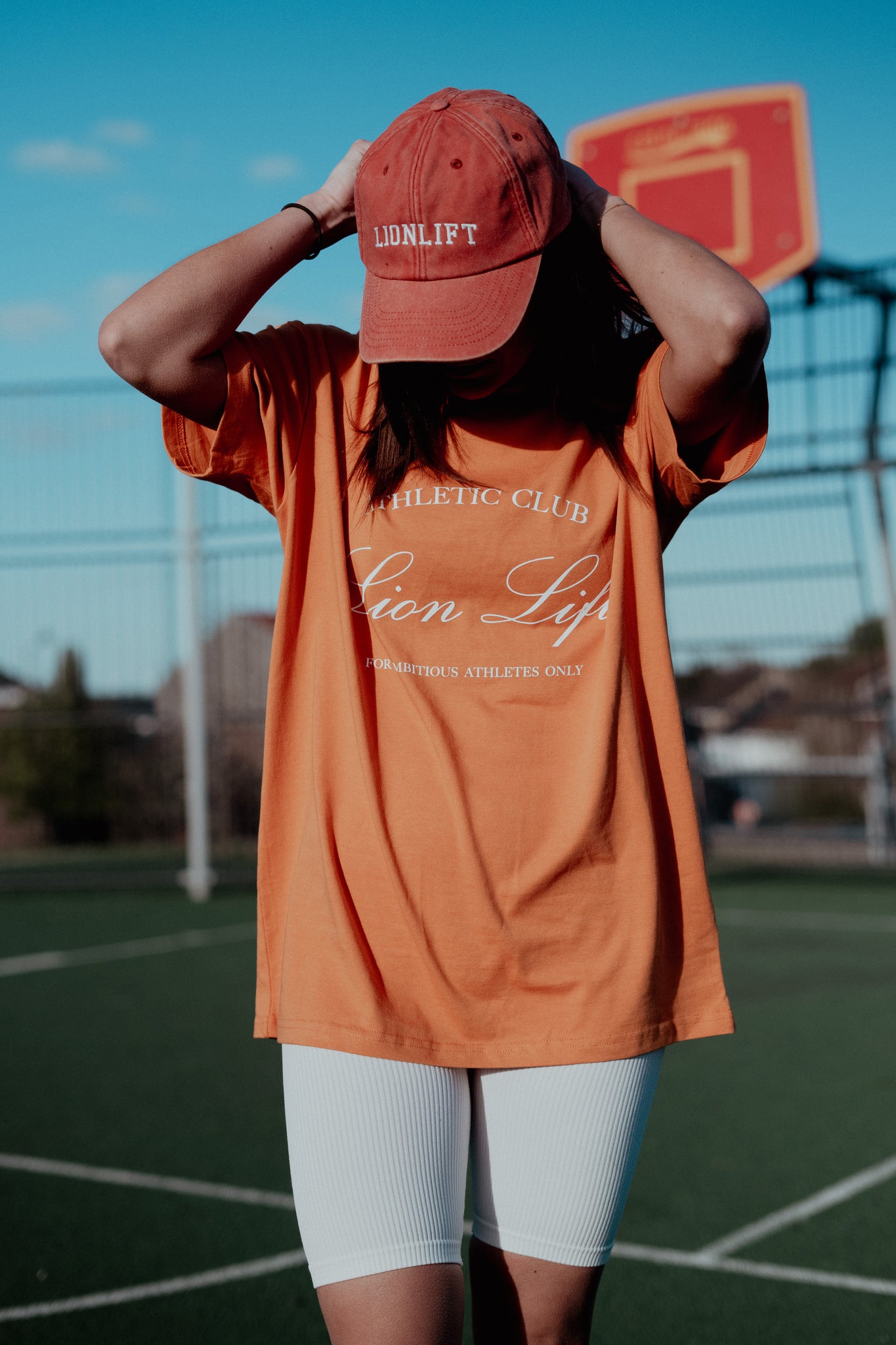 T-SHIRT OVERSIZED ORANGE "ATHLETIC CLUB" UNISEXE