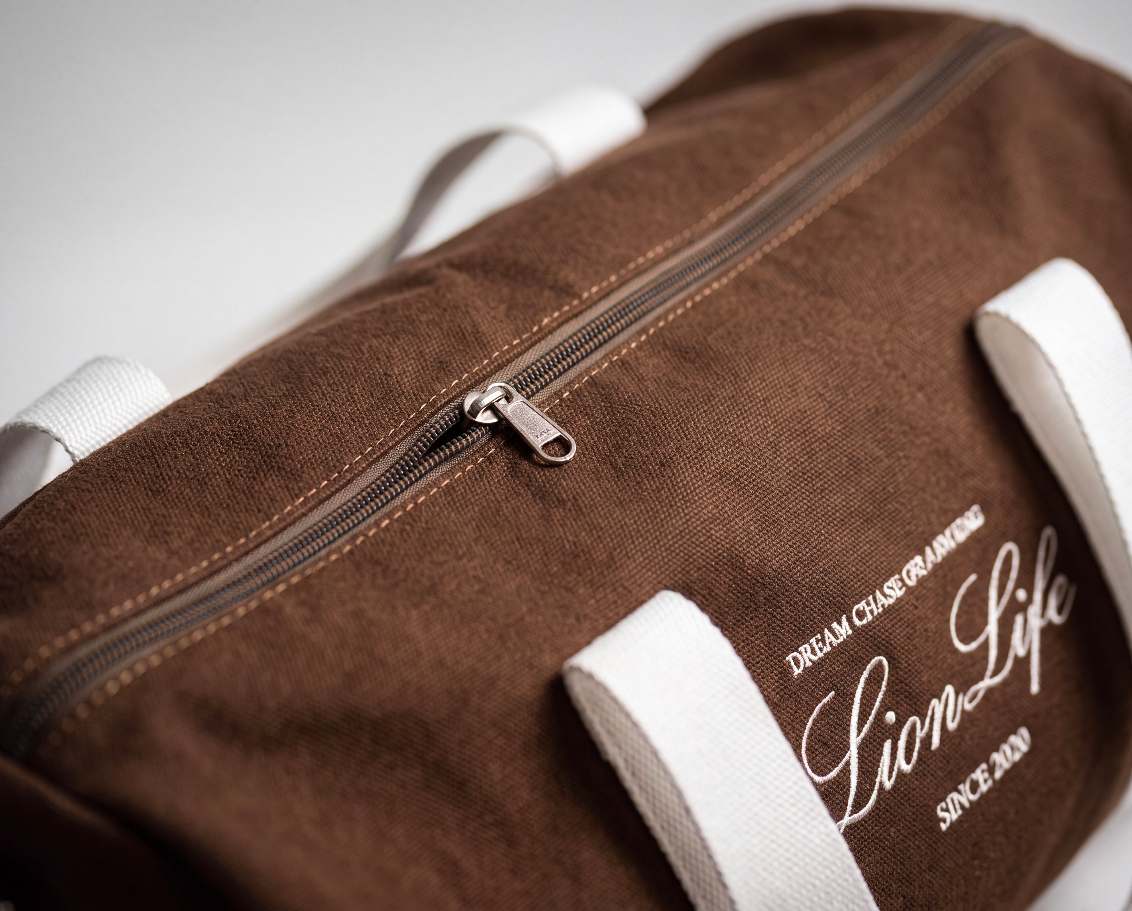 DUFFEL BAG "SIGNATURE"